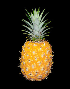 orange pineapple in black background thumbnail