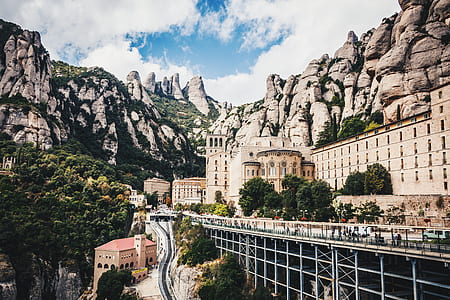 building near mountain thumbnail