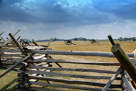 white and brown wooden fence on grass field thumbnail