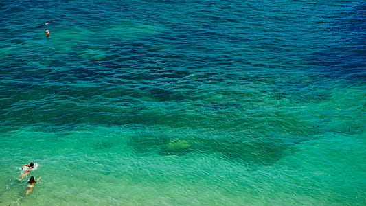 Ocean Water With Swimmers Photo thumbnail