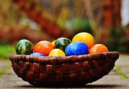 bunch of assorted-color eggs on tray thumbnail