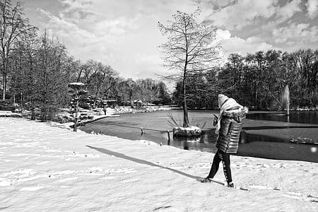 woman standing near tree thumbnail