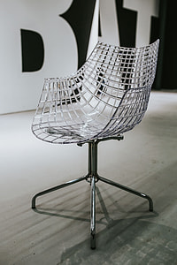 Various designer chairs and tables on an exhibition thumbnail