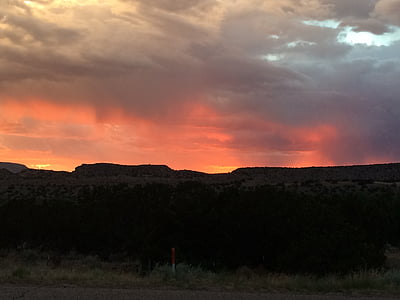 silhouette photography of mountain during golden hour thumbnail