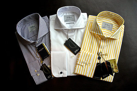 three assorted-color of buttoned shirts thumbnail