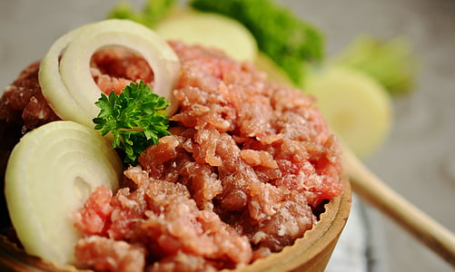 sliced onions on cooked meat thumbnail
