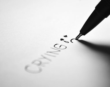 pen writing crying on the paper thumbnail