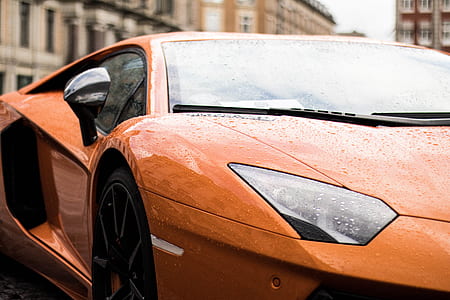 photo of orange Lamborghini Aventador thumbnail