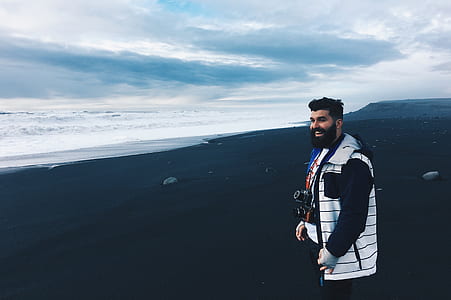 man wearing white and black jacket thumbnail