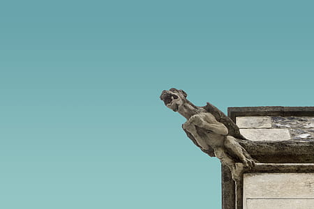 brown gargoyle low-angle photography thumbnail