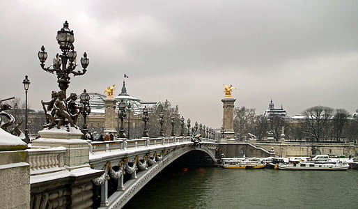 several boats under bridge thumbnail