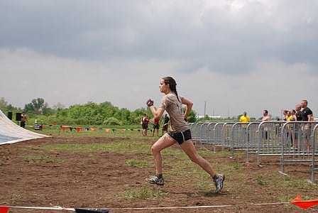 woman wering gray shirt and black shorts under cloudy sky during daytime thumbnail