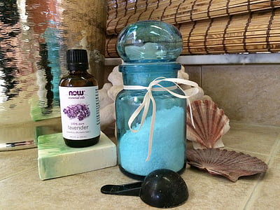 blue glass jar beside behind measuring scoop thumbnail