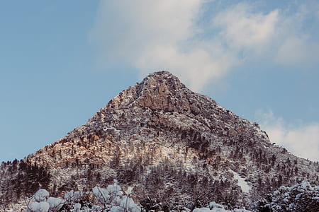 brown mountain under white clouds thumbnail