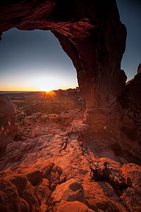 two person sitting on rock mountain thumbnail