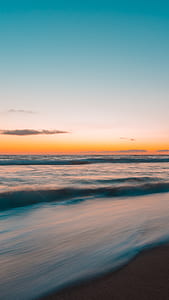 photo of beach during daytime thumbnail