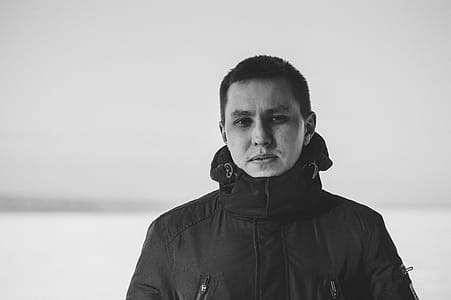 Grayscale Photography of Man Wearing Jacket thumbnail