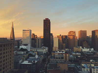 aerial view of buildings during sunset thumbnail