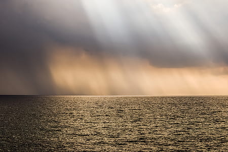 photo of black body of water thumbnail