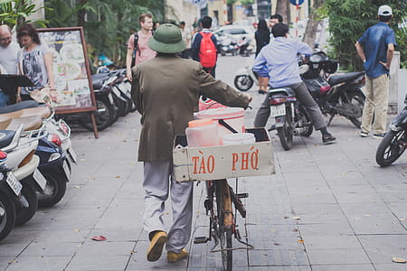 Man Walking With Bike thumbnail