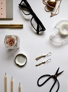 Top-view Photography of White Wooden Table With Personal Accessories on Top thumbnail