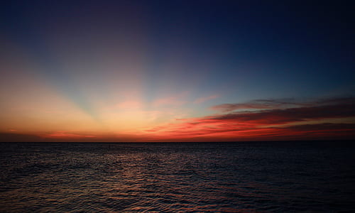 ocean waters under sunset thumbnail