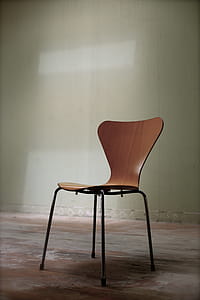 Brown and Black Chair on Brown Surface thumbnail
