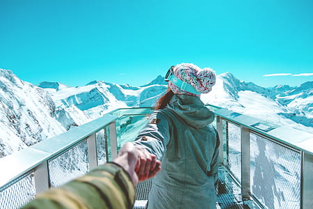 woman wearing gray hooded jacket thumbnail