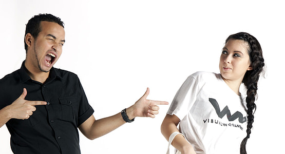 man wearing polo shirt while woman wearing white t-shirt thumbnail
