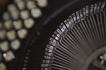 Black and Gray Typewriter in Close Up Shot thumbnail