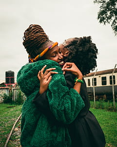 two women hugging each other thumbnail