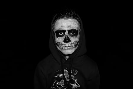 man with skull face paint thumbnail