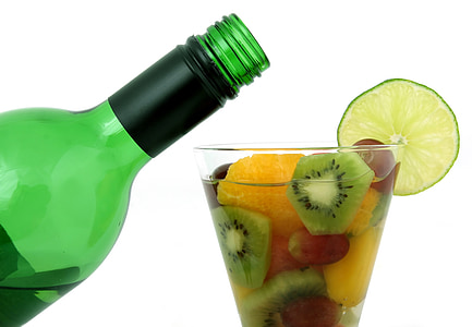 fruits in glass beside bottle thumbnail