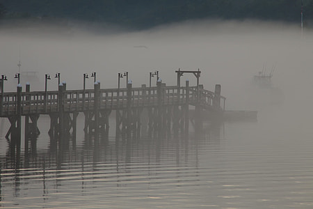 gray bridge above body of water thumbnail