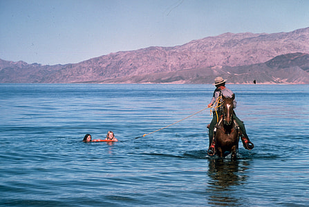 Ranger helping people out of the water at Lake Mead, Nevada thumbnail