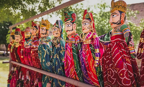 Male and Female Dolls With Colorful Costumes thumbnail