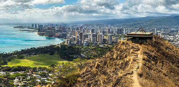cityscape photo of high-rise buildings in front of blue beach thumbnail