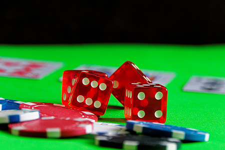 close-up photography of dice and poker chips thumbnail