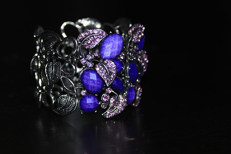 closeup photo of silver-colored purple gemstone encrusted ring thumbnail