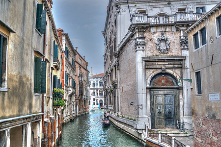 person on boat in grand canal thumbnail