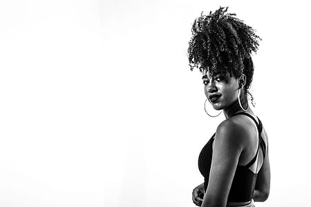 grayscale photo of woman standing thumbnail