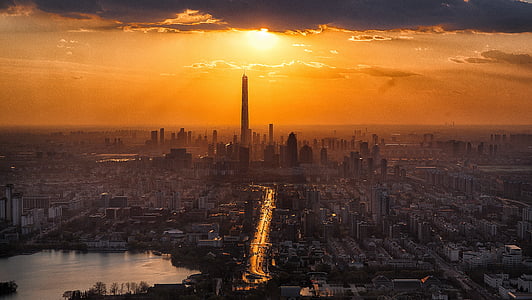 aerial photography of city skyline during sunset thumbnail