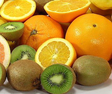 bunch of kiwi and orange fruits thumbnail