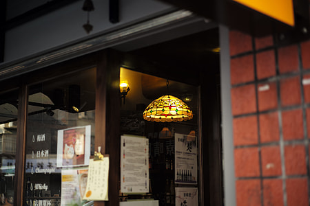 pendant light across glass door thumbnail