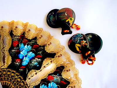 black and brown hand fan thumbnail