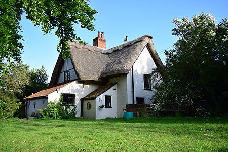 gray and white 2-storey house thumbnail