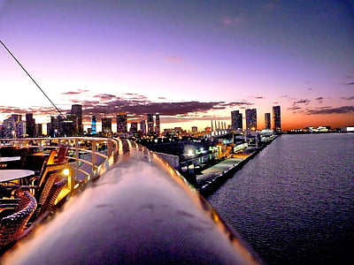 city building near the body of water thumbnail