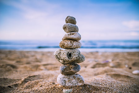 gray stone pile with overview of beach thumbnail