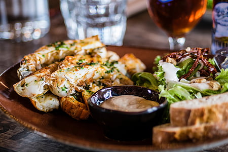 spring rolls and vegetable salad on plate thumbnail