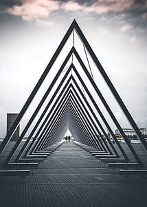 architectural photography of triangle archway thumbnail